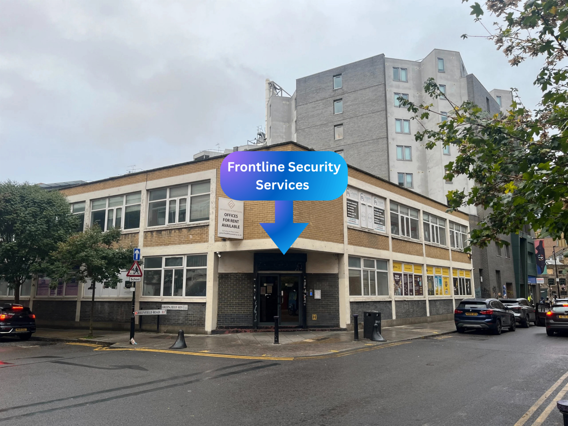 Street view of Frontline Security Services Ltd entrance on Fieldgate Street — Corner Building Opposite East London Mosque